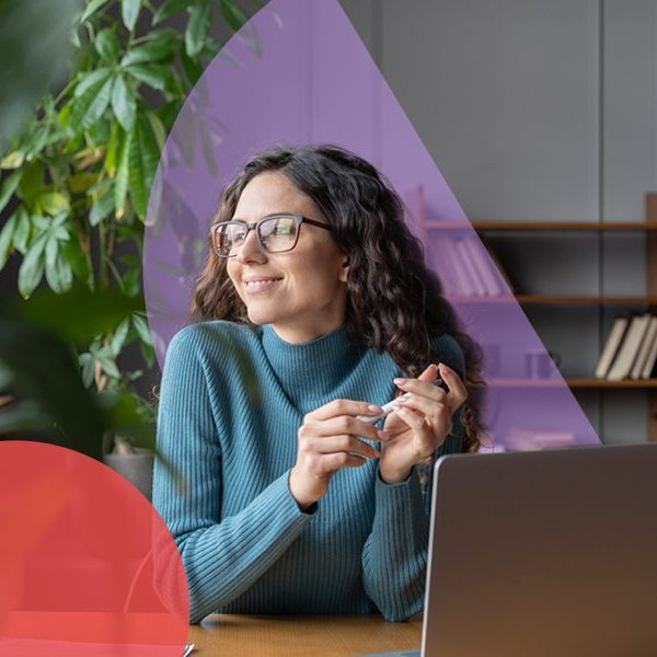 woman sat in front of laptop