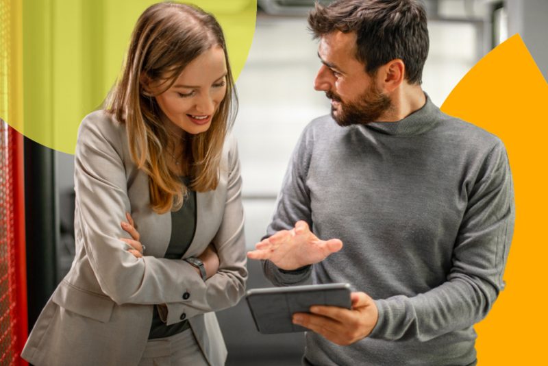 two people discussing data insights